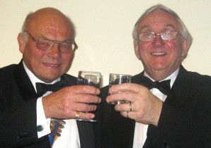 Canon Roger Cressey raises a glass with club president David Pickover
